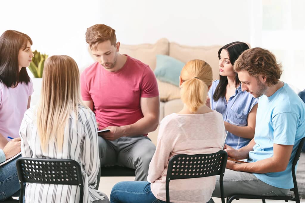 an image of people learning the differences between inpatient and outpatient treatment