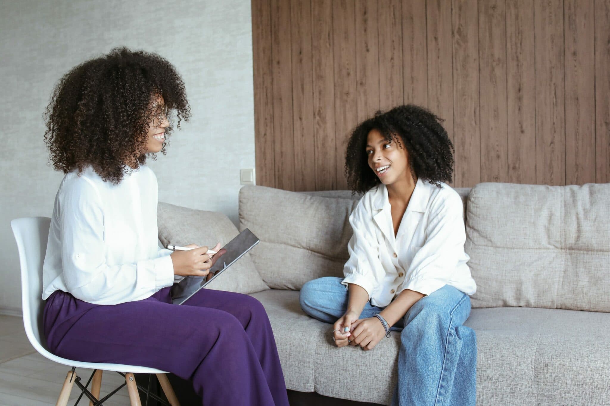 An image of two women at a fountain valley drug rehab