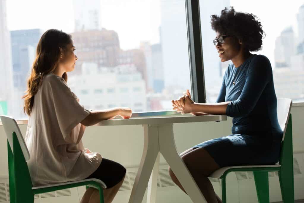 an image of two people discussing drug and alcohol counseling