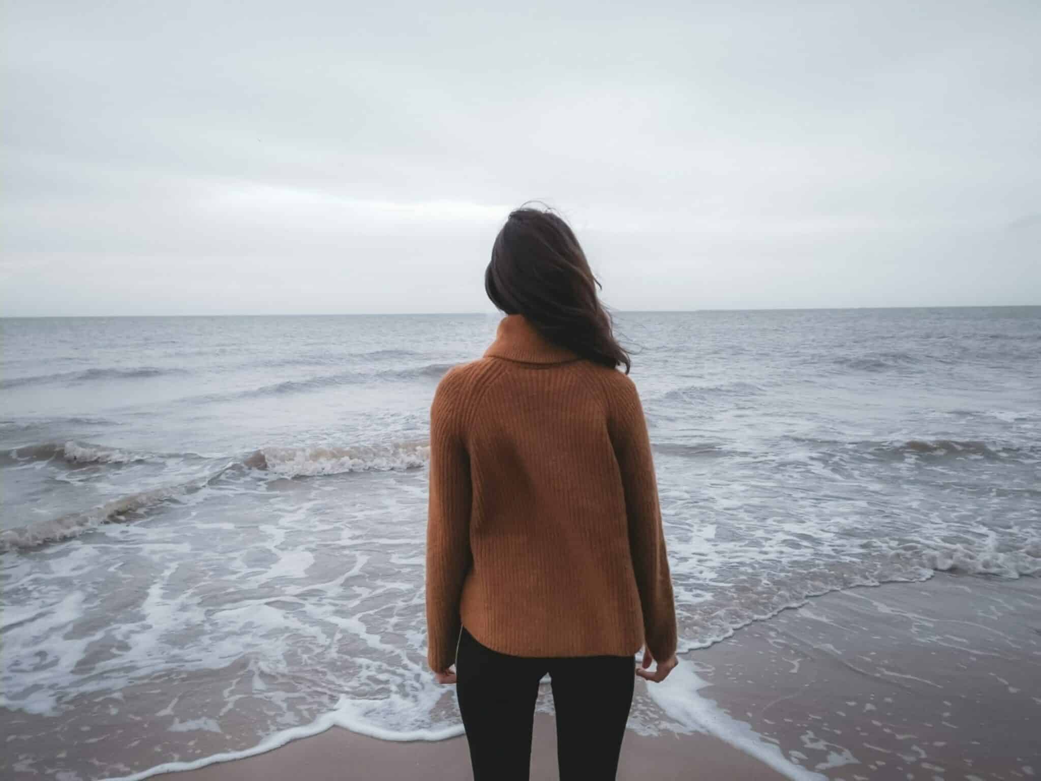 An image of a woman learning about the behavioral model of addiction