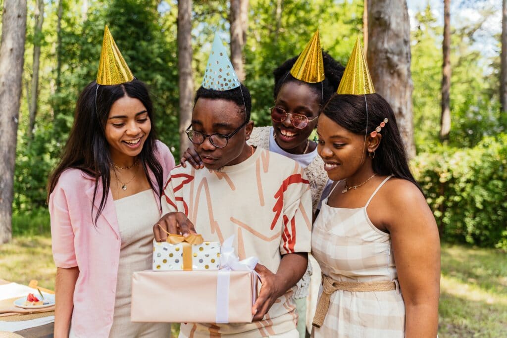 An image of people opening Sobriety gifts