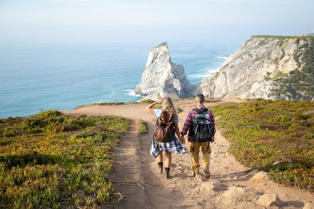 An image of two people on a hike practicing Self Care in Recovery