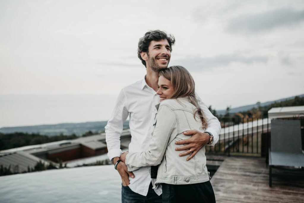 an image of a woman hugging her boyfriend after he got help for drug addiction