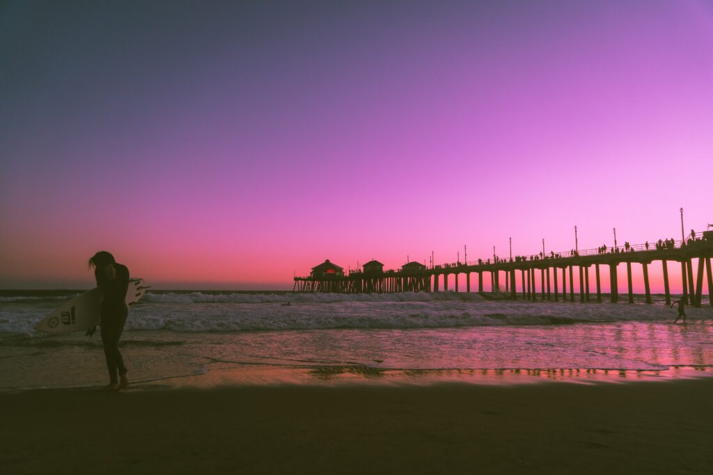 an image of the Huntington Beach pier at sunset