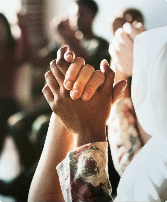 two people holding hands