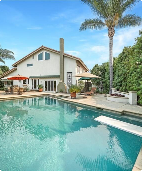 pool in the backyard of a home