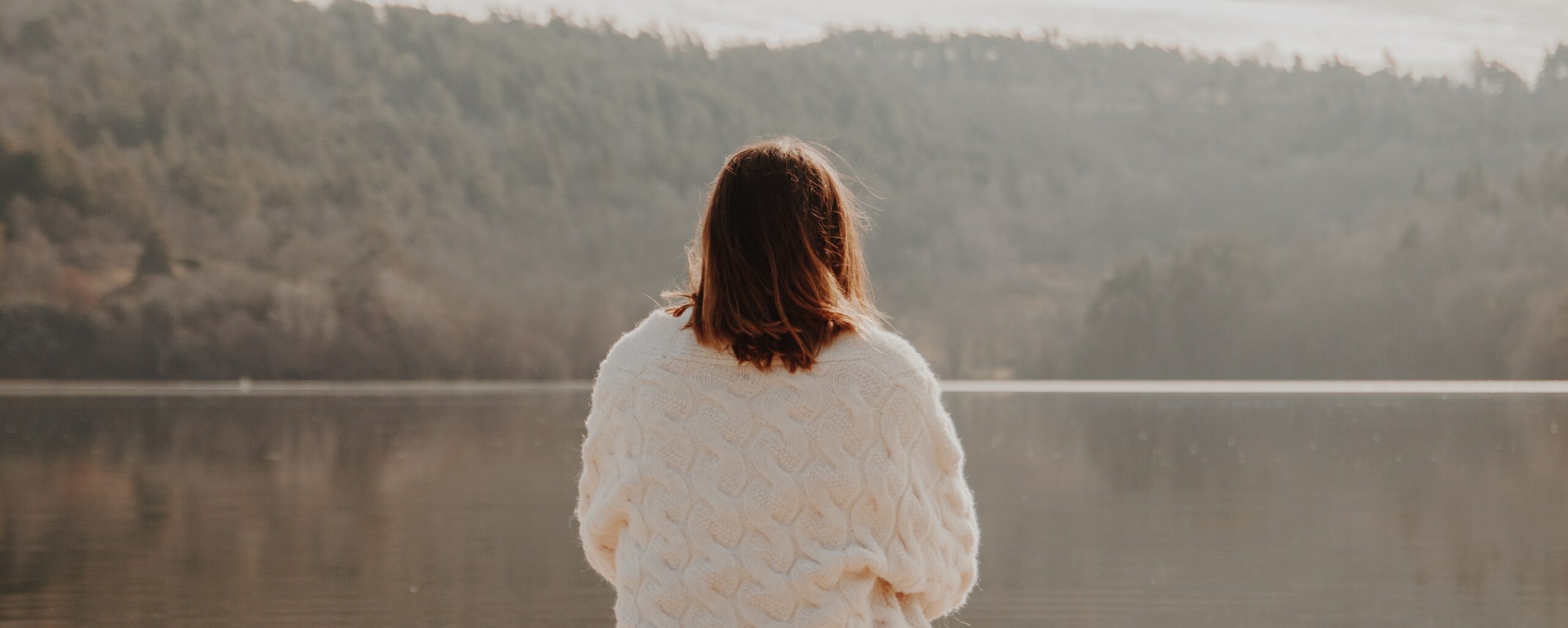 woman looking out at lake representing lexapro withdrawal