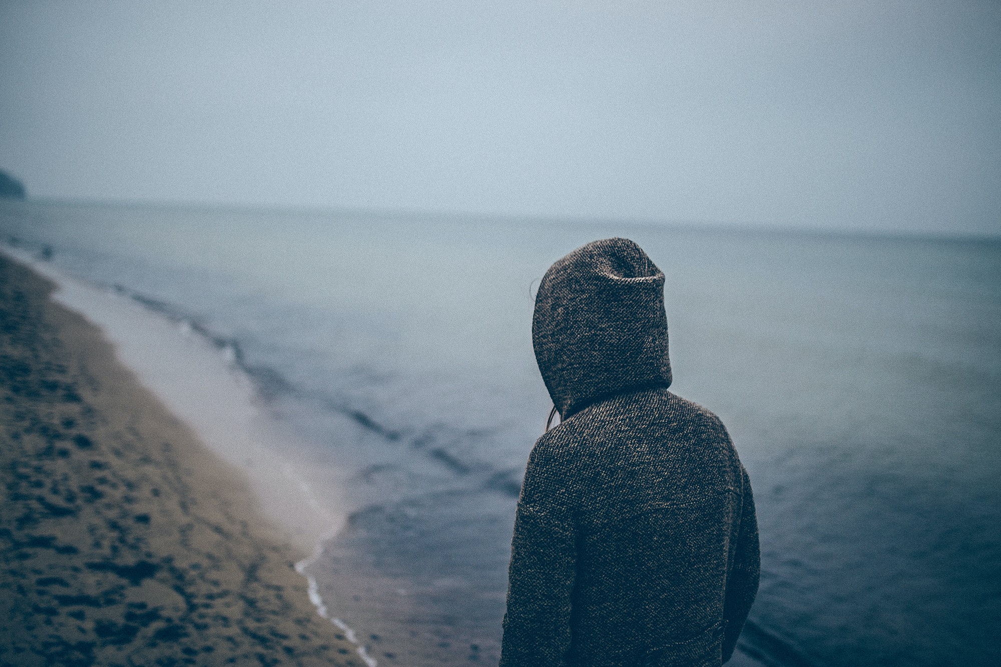 an image of a man on the beach to represent should i go to rehab for prescription drug addiction?