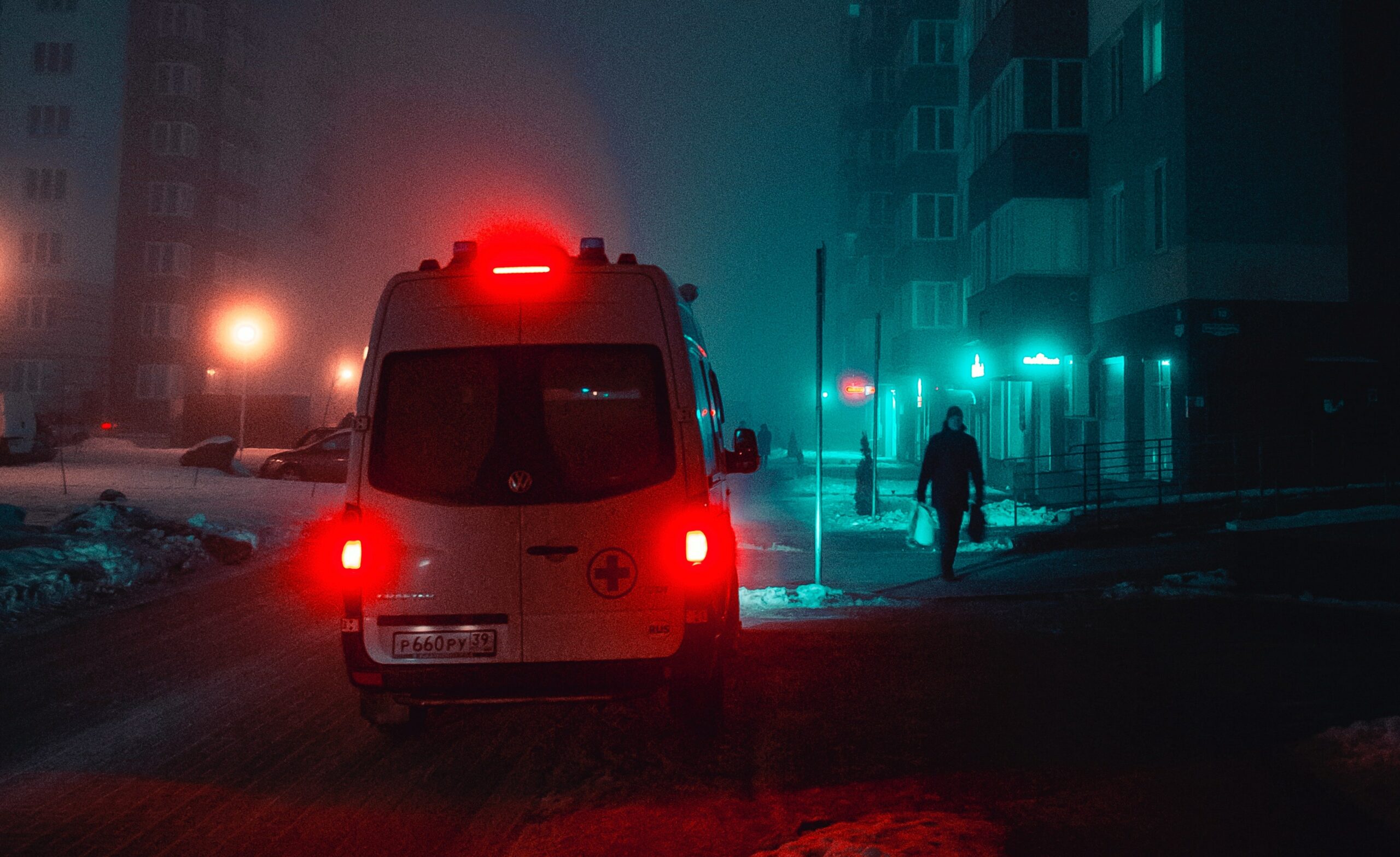 an ambulance at night to represent barbiturate overdose treatment in california.