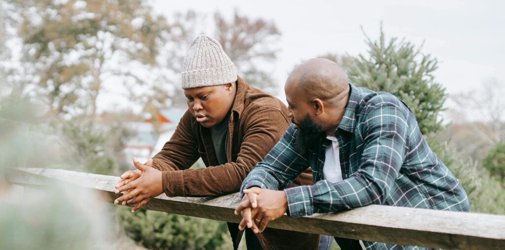 man talking to teen about signs your kid is using drugs