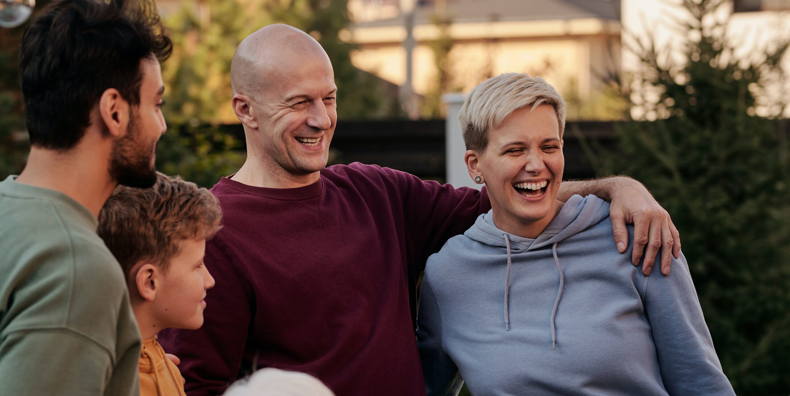 Group of people hugging representing how to stage an intervention