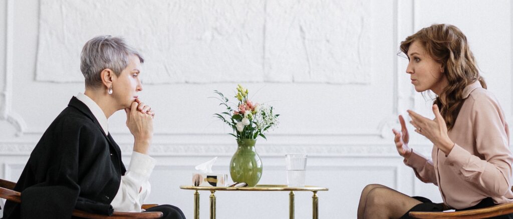 two people in an evaluation session representing alcohol evaluation