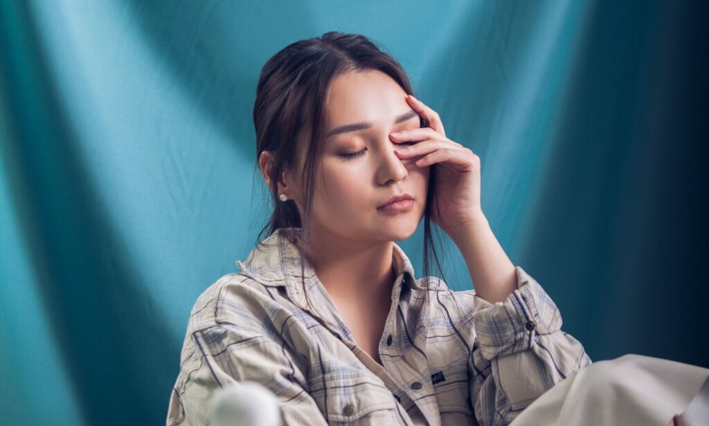 image of woman representing alcohol and skin damage