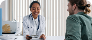 doctor speaking with a patient in a doctors office