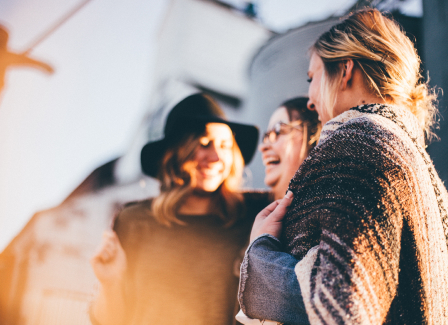 women hanging out together and laughing