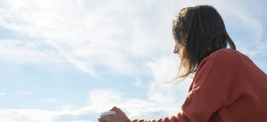 person sitting thinking representing how to increase dopamine naturally
