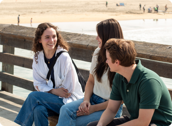 group of people sitting together representing how to increase dopamine levels